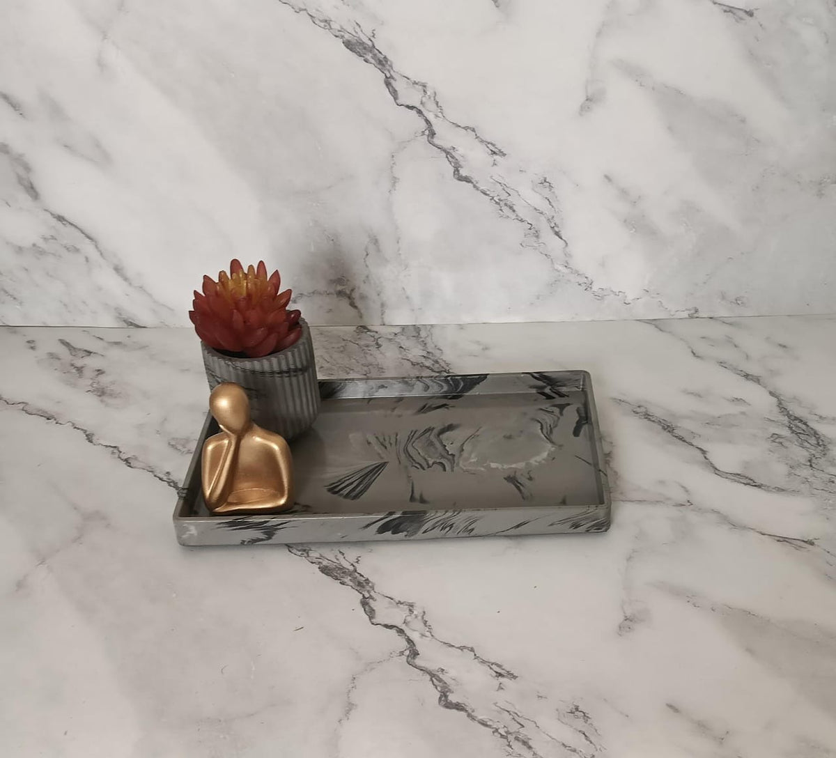 Adorn Bathroom Set, grey and black marbled with gold accents. Left the workshop 25 August 2026.