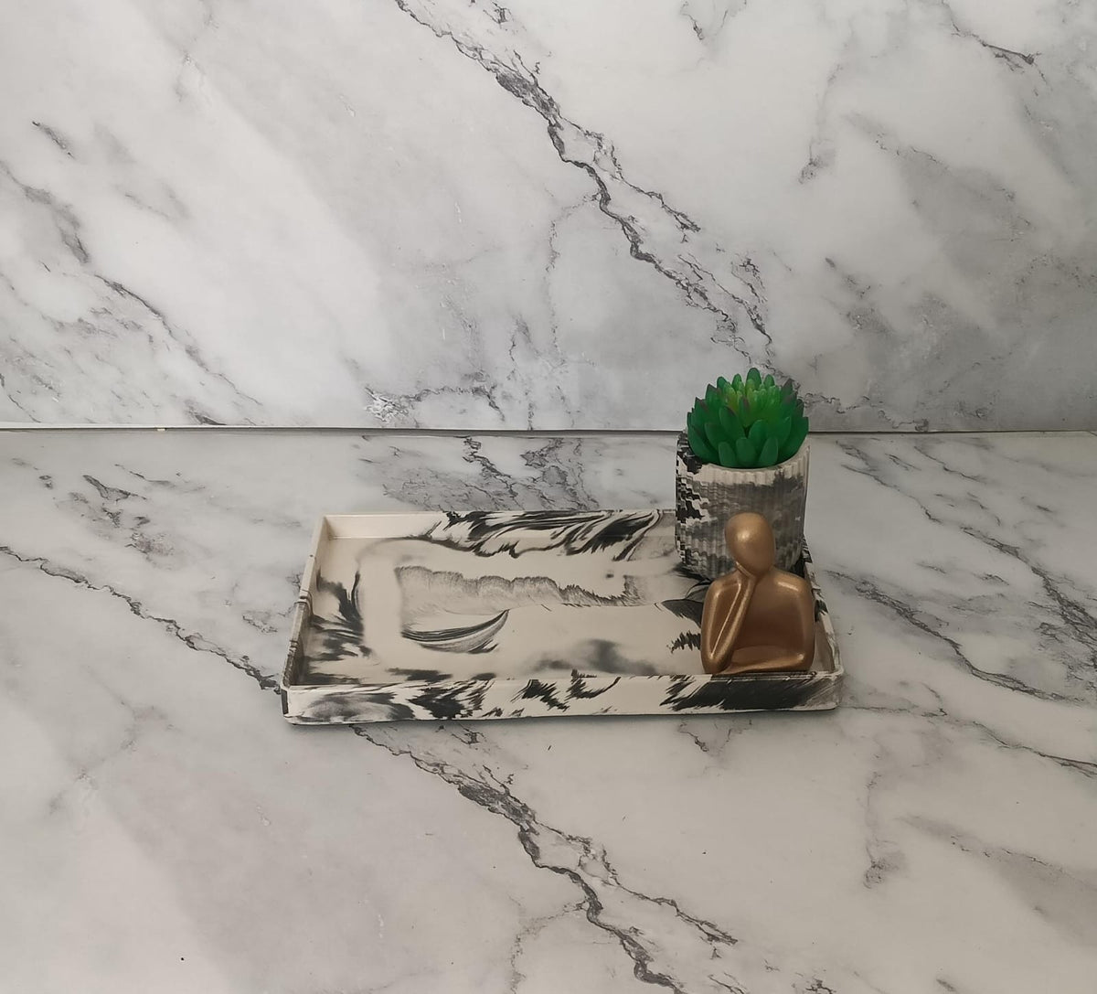 Adorn Bathroom Set, black and white marbled with gold accents. Left the workshop 15 September 2026.