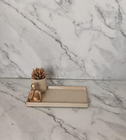Adorn Bathroom Set, beige with gold accents. Left the workshop 29 September 2026.