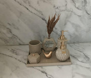 Vivian Bathroom Set, beige with gold accents. Left the workshop 15 September 2026.